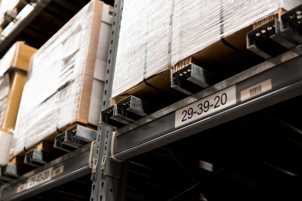 Unbranded warehouse cartons representing barcode label quality and traceability