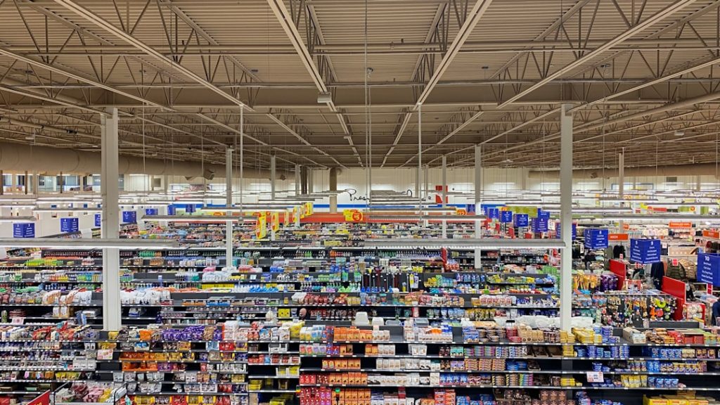 Unbranded supermarket aisles illustrating connected electronic shelf label operations